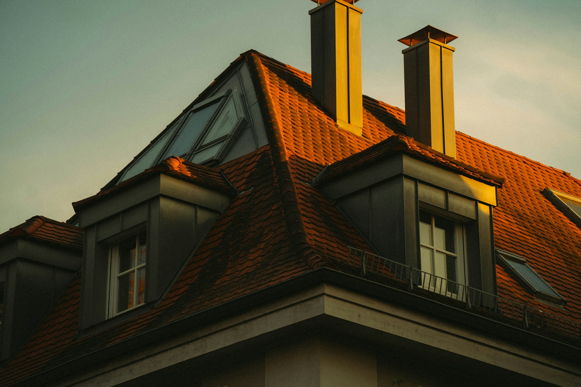 The rooftop is lit by the warm sunset.